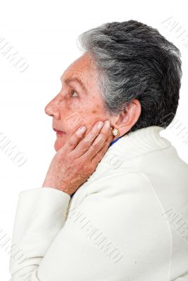 pensive elderly woman