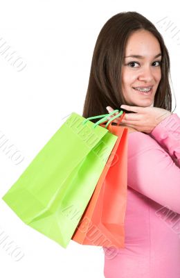 girl in pink with shopping bags