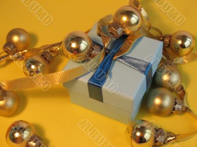 Blue gift box with golden balls