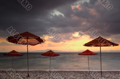 Beach umbrellas on a windy day