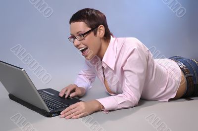 The shouting business woman with a computer