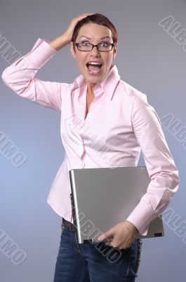 The shouting business woman with a computer