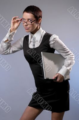 The business woman with a computer