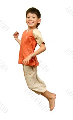 Boy jumps on white background.