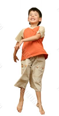 Boy jumps on white background.