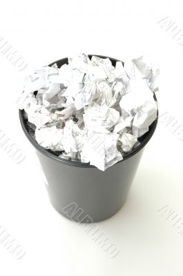 Bin filled with paper
