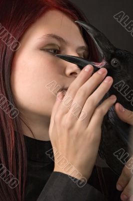 young woman with raven