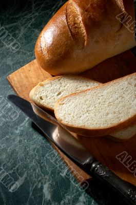 white loaf and knife