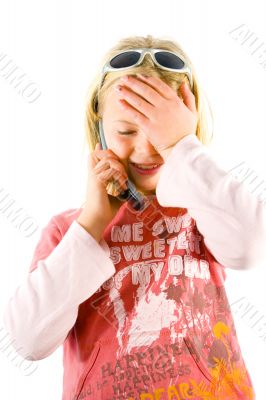 Young girl on the phone, confused