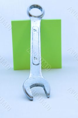 spanner against the background of a green square