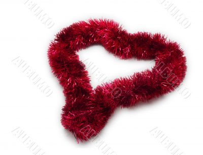 Isolated Christmas Tinsel Decoration Arranged in a heart shape
