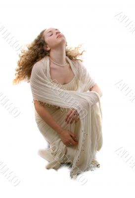 Beauty with curly hair in  white dress