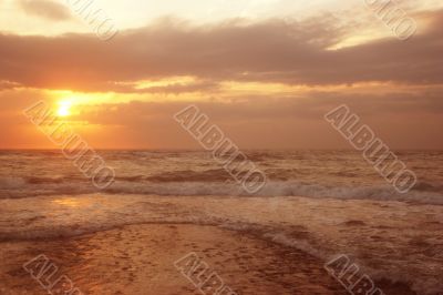 Pink sunset at sea