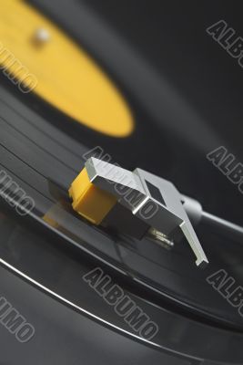 Vinyl record on turntable - tilted view