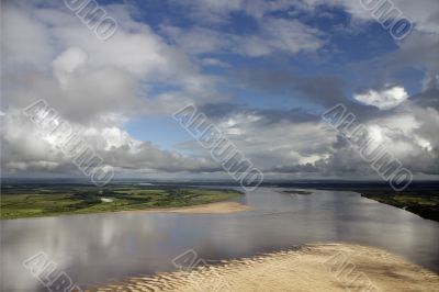 Clouds over big river.