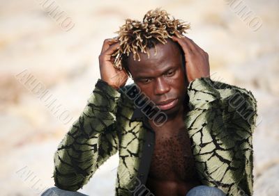 Portrait of young sad man