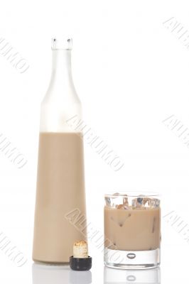 Whiskey cream bottle and glass