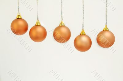 Five gold spheres