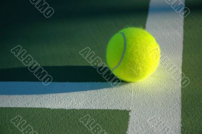 Closeup of Tennis Ball on court