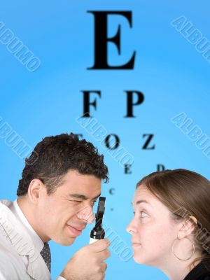 eye test chart with doctor and patient