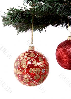 christmas balls hanging on tree branch