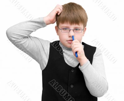 schoolboy picks one`s nose