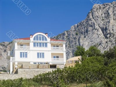 Stone cottage in mountains