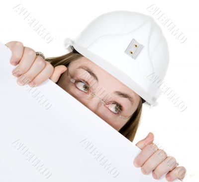 curious architect looking over white card