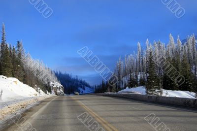 Winter road in Canadian Rockies