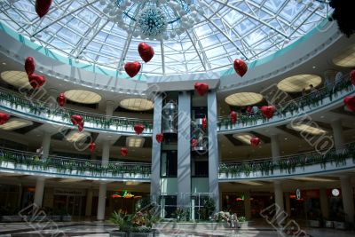 Glass dome with red hearts ballons