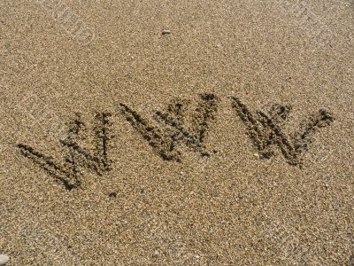Inscription on sea sand WWW