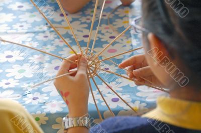 Child Learning Handicrafts