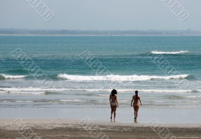 Two girls on a coastline