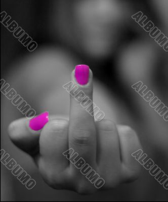 finger with pink nails `fuck off`