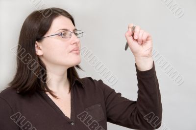Beautiful woman writting in air. Beautiful woman writting in air.