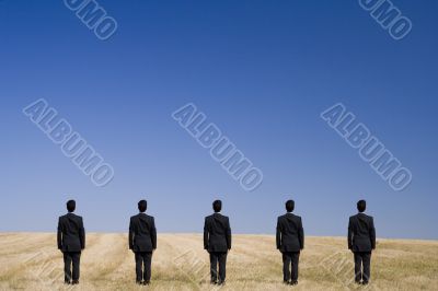 Five standing on the field