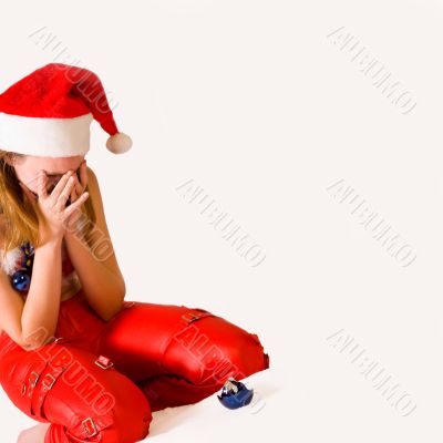 Crying faerie with broken christmas decoration Crying faerie with broken christmas decoration
