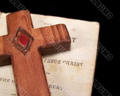 Vintage Bible and Wooden Cross