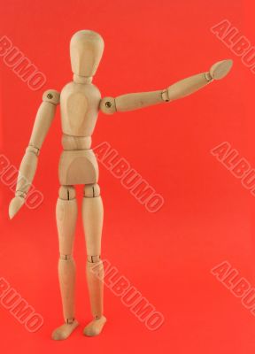 wooden figure in a welcoming pose
