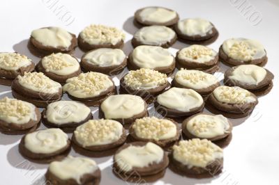 Chocolate cookies with nuts and frosting