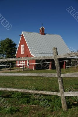 New England red barn and fence