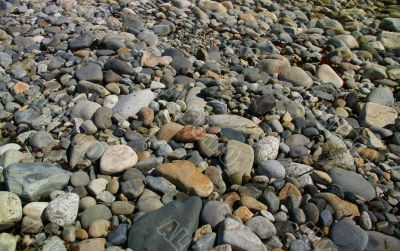 Granite pebbles, rounded by the ocean	