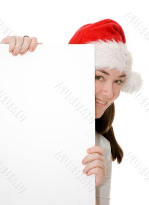 santa hiding behind a card