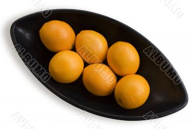 Oranges into black Japanese vase 1