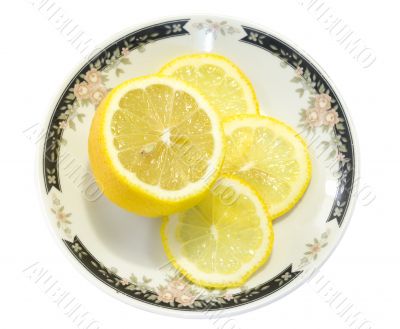 Sliced lemon served on ornamented plate 2