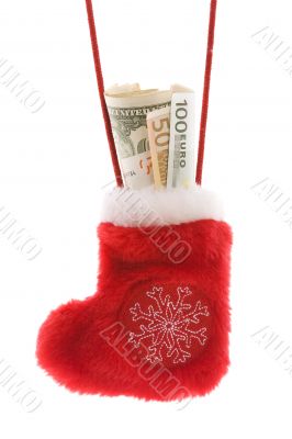 Red christmas sock with euro and dollar cash money