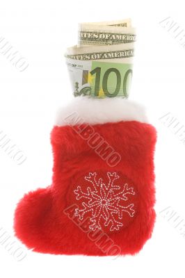 Red christmas sock with euro and dollar cash money