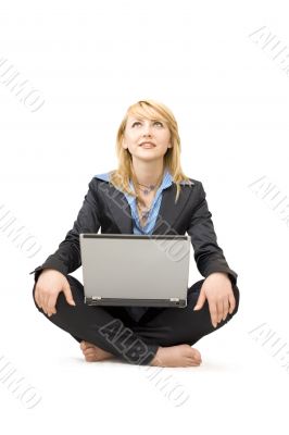 Shoeless woman with laptop do meditative exercises #2