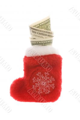 Red christmas sock with dollar cash money isolated on white