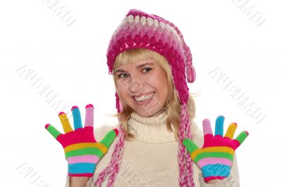 Smiling blond girl in cap and Multi-coloured gloves